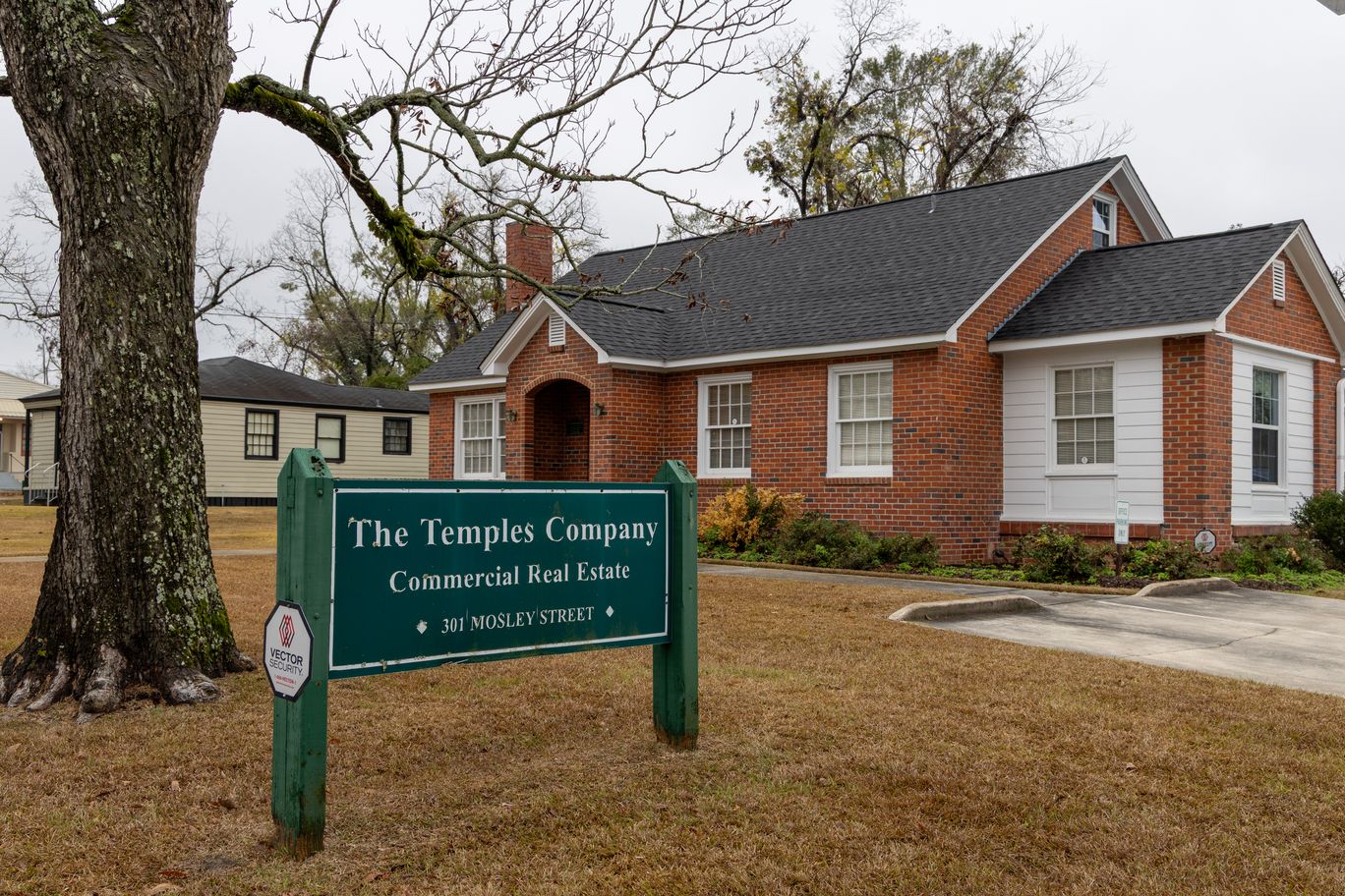 The Temples Company office at 301 Mosley Street with its Commercial Real Estate sign